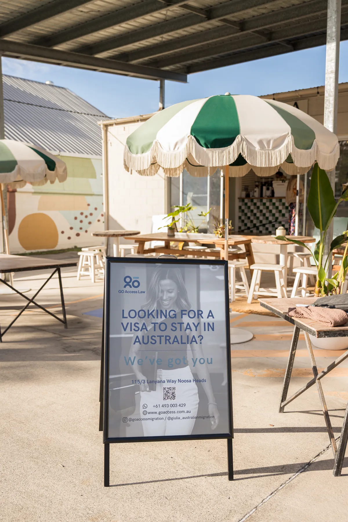 GO Access Law welcome sign outside Noosa Coffee Roastery